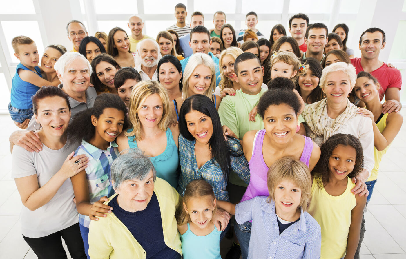 A smiling church community gathered together