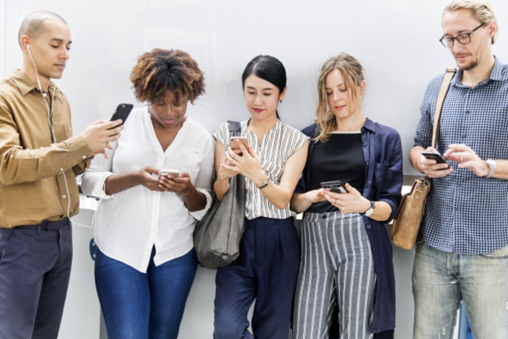 Church members reading messages on their phones
